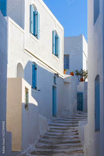 Street with typical Cycladic architecture in Artemonas village on Sifnos island in Greece.