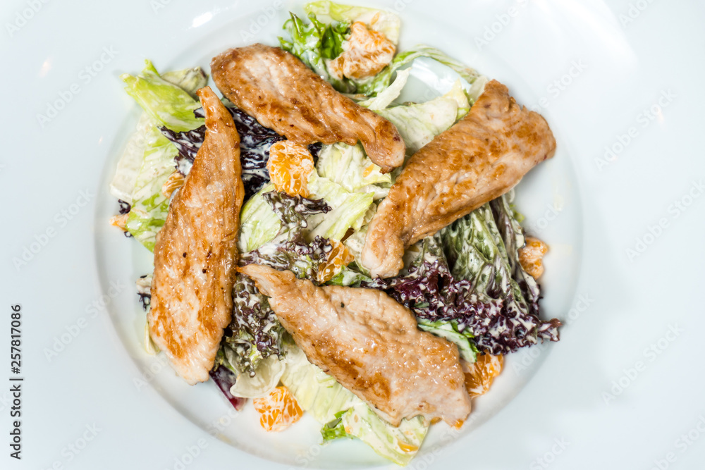 salad with chicken meat cream sauce on a white background salad with chicken meat cream sauce on a white background