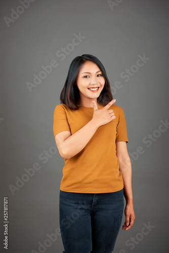 Beautiful Asian woman posing at camera