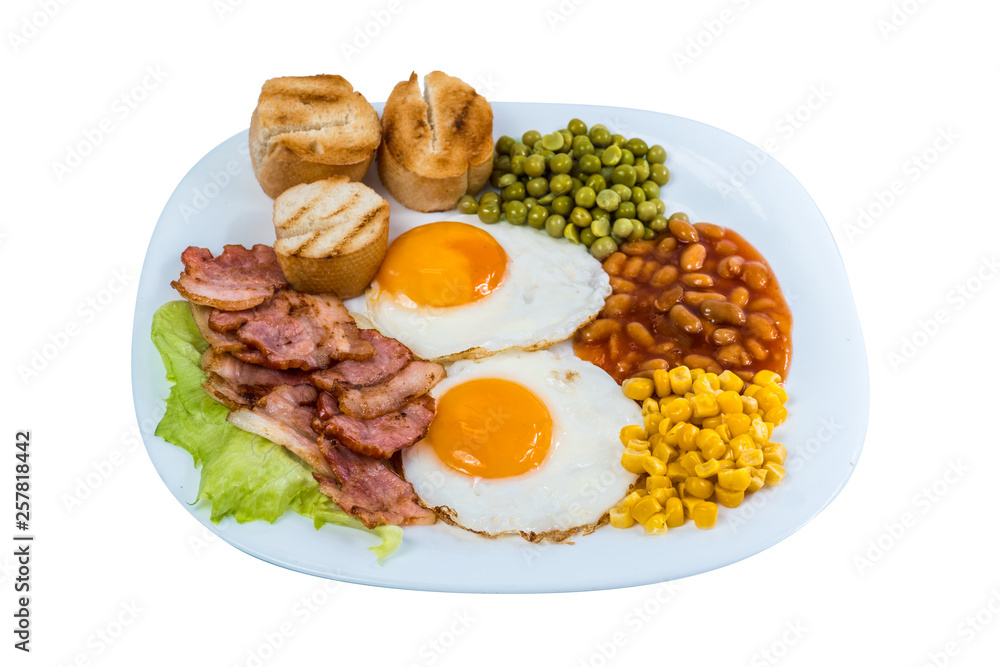 breakfast fried egg peas, corn grains, beans and fried bacon on a white plate isolated breakfast fried egg peas, corn grains, beans and fried bacon on a white plate isolated