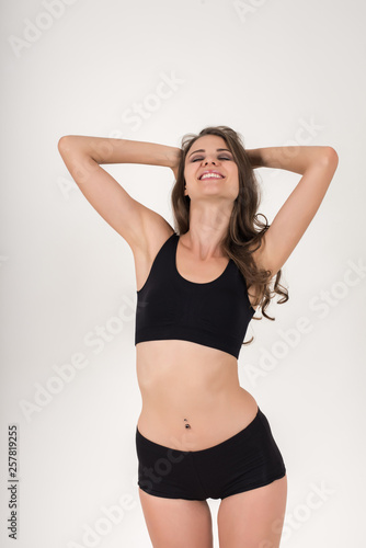 Beautiful woman with healthy body on white background