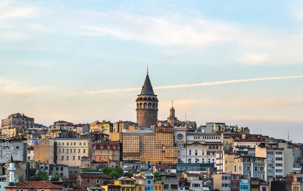 Cityscape Beyoglu district old houses with Galata tower on top in Istanbul, Turkey.