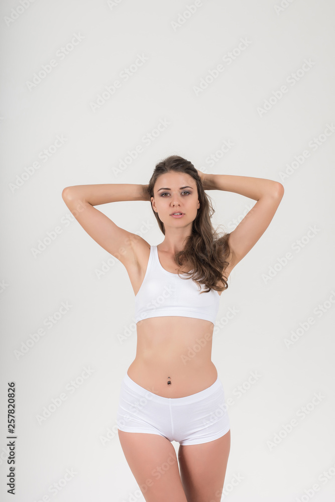 Beautiful woman with healthy body on white background Beautiful woman with healthy body on white background