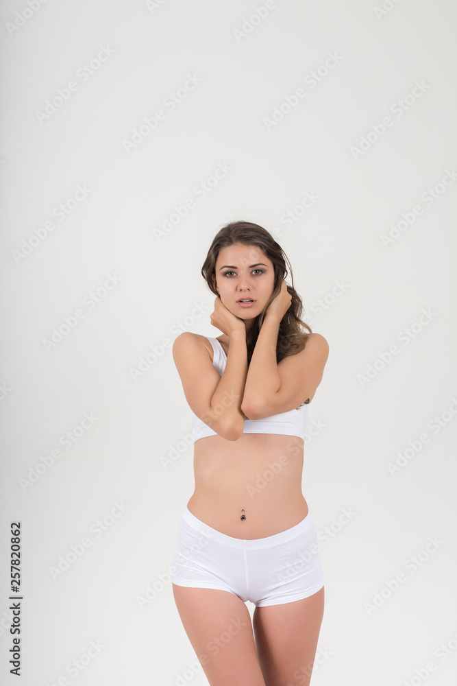 Beautiful woman with healthy body on white background Beautiful woman with healthy body on white background