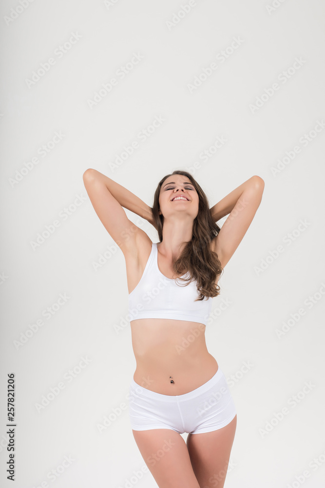 Beautiful woman with healthy body on white background Beautiful woman with healthy body on white background