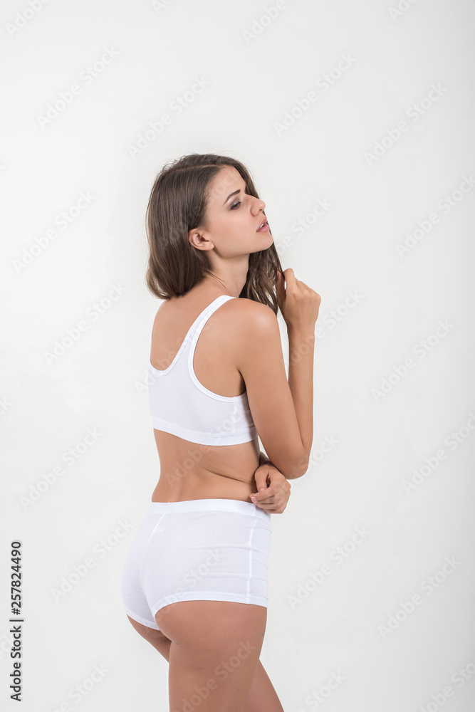 Beautiful woman with healthy body on white background Beautiful woman with healthy body on white background