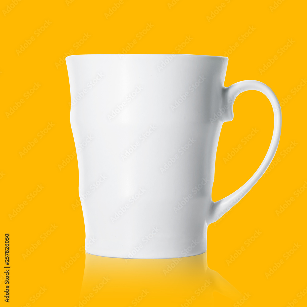 White porcelain mug isolated on orange background, mockup White porcelain mug isolated on orange background, mockup