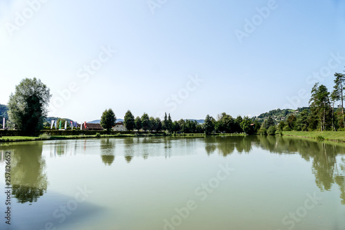 reflection of trees in lake, digital photo picture as a background photo