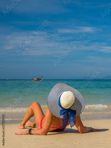 Young woman at the tropical beach