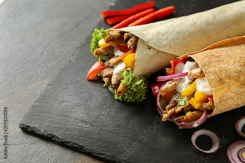 Bild auf Leinwand Tasty doner kebabs on slate plate