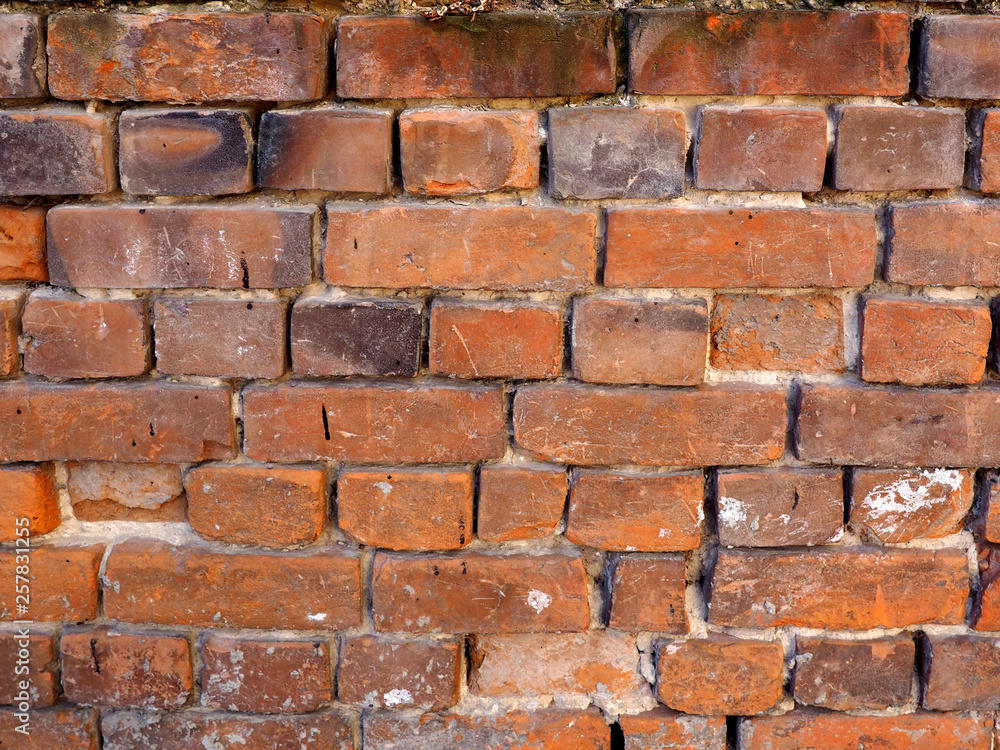 Obraz premium Weathered old brick wall