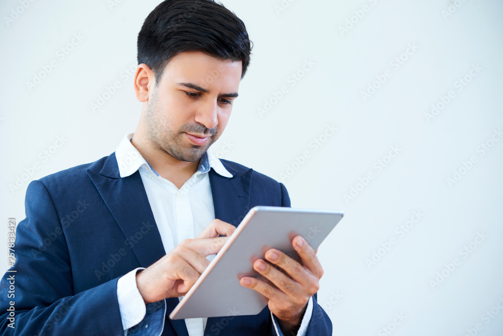 Office worker using digital tablet Office worker using digital tablet