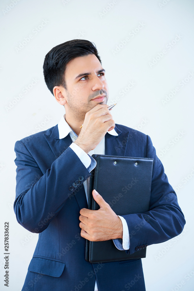 Pensive businessman with folder Pensive businessman with folder