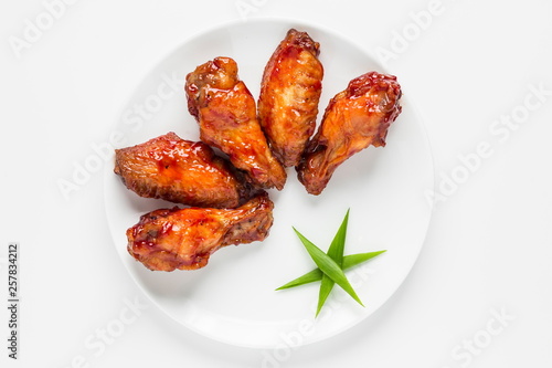Fried chicken wings appertizer top view isolated on white background