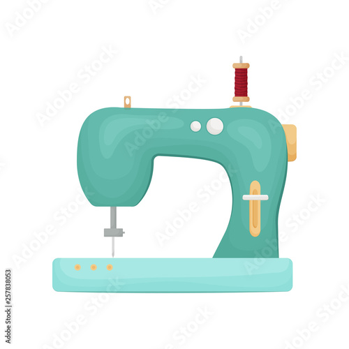 Retro designed model of sewing machine in green color isolated on white background