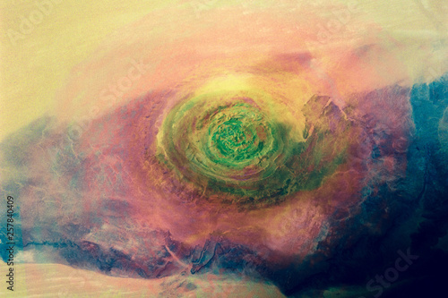Sahara eye. Richat Structure in Western Mauritania. Colorful collage. Elements of this image furnished by NASA. photo