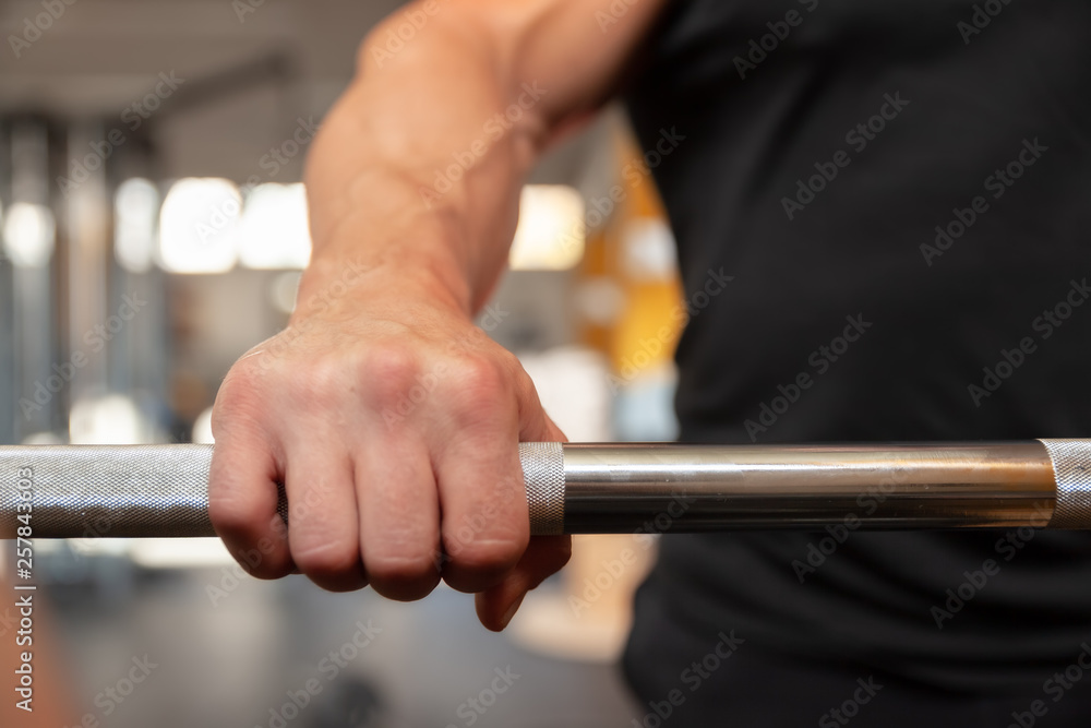 grabbing a dumbbell grabbing a dumbbell
