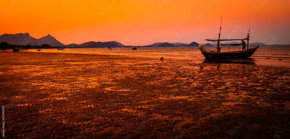 beautiful seascape landscape sea beach mountain with boat  silhouette photography at sunset nature backgroun