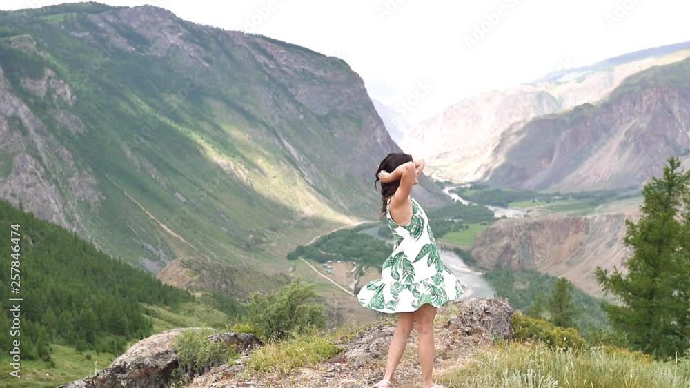 custom made wallpaper toronto digitalyoung woman in the mountains in a beautiful dress. running, walking, spinning. enjoying nature