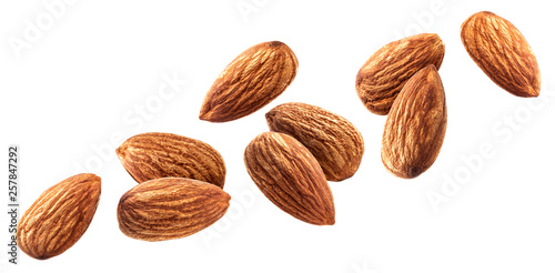 Foto Flying almond isolated on white background with clipping path