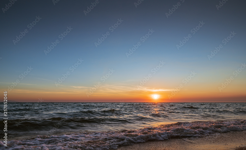 Fototapeta premium Sunset sky background on the beach summer concept background.