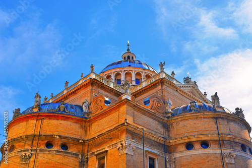 PARMA,ITALY Detail of Basilica of Santa Maria della Steccata church against cloudy blue sky in Parma Emilia-Romagna. photo