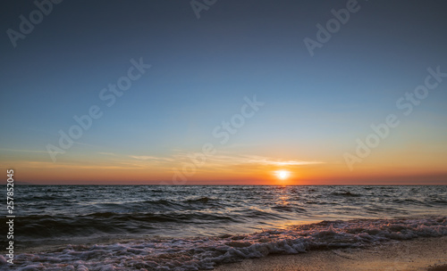 Sunset sky background on the beach summer concept background.