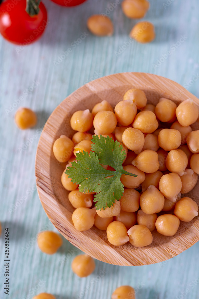 chickpeas on wooden surface chickpeas on wooden surface