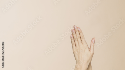 Female hands praying