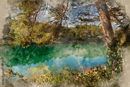 Fototapeta Naklejka Na Ścianę i Meble -  Beautiful vibrant landscape image of old clay pit quarry lake with unusual colored green water
