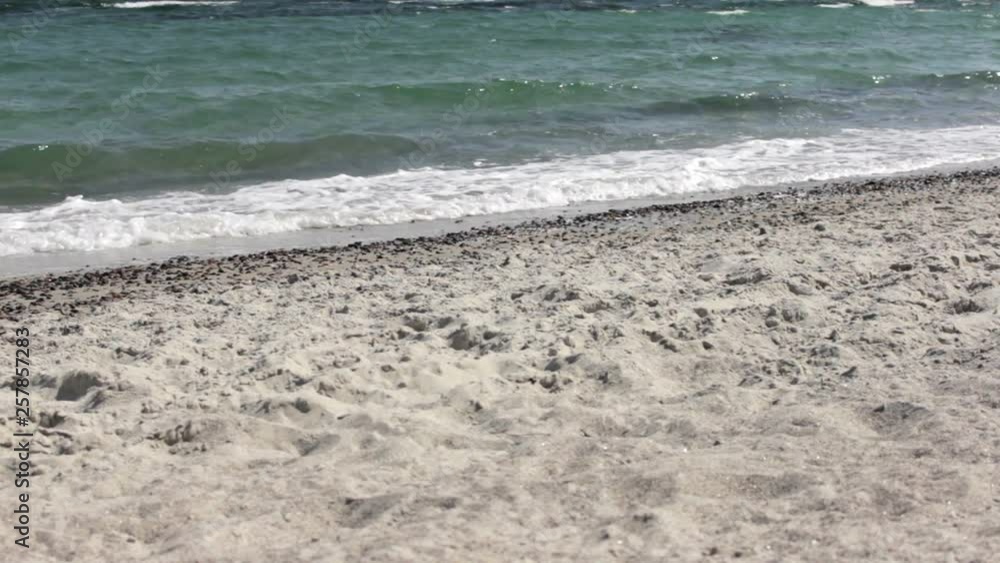 Sea Waves and Beach: The waves from the sea of beach come rushing to the coast. Sea Waves and Beach: The waves from the sea of beach come rushing to the coast.