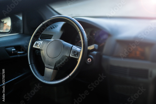 wheel of a modern car, interior. © velimir