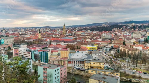 4k Day to Night Zoom in Timelapse of Cluj Napoca cityscape viewed from Cetatuia Hill in Cluj Napoca, Romania. Time lapse in Cluj Napoca, known as Klausenburg and Kolozsvar, Transylvania, Romania