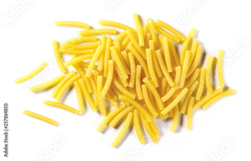 Macaroni, raw pasta isolated on white background, top view photo