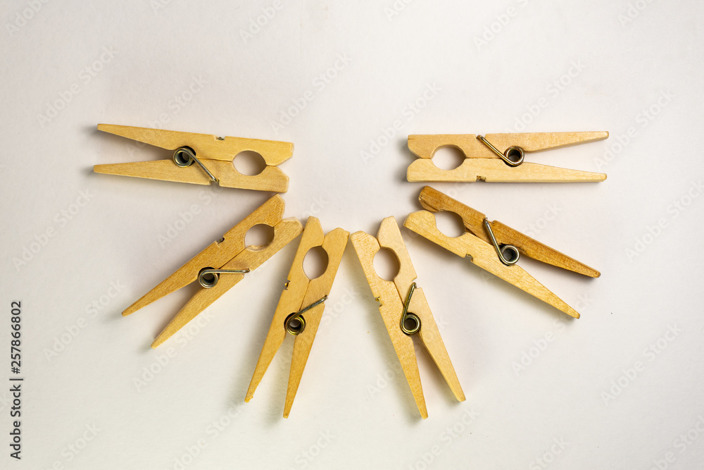 wooden clothespins on white background wooden clothespins on white background