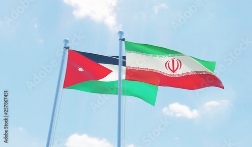 Iran and Jordan, two flags waving against blue sky. 3d image