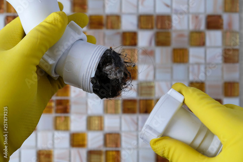 Fotografie Elimination of blockage in sewer pipes