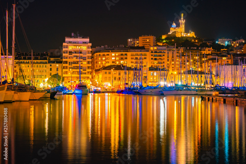 Marseille  France at night. The famous european harbour view on the Notre Dame de la Garde