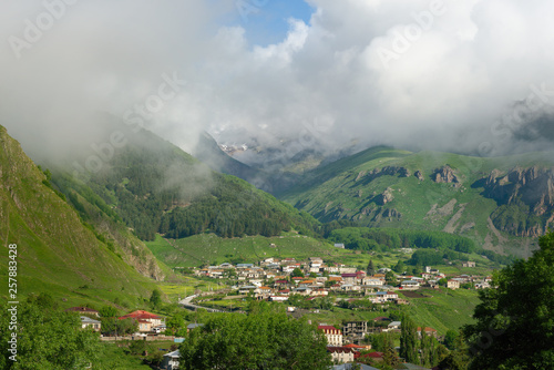 view of the Stepantsminda village in the mountains summer. Georgia