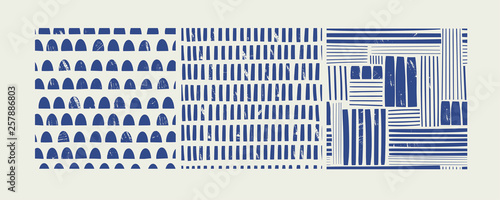 Various lines and shapes. Stamp texture. Set of three blue and white abstract seamless patterns. Hand drawn vector illustration.  Every pattern is isolated