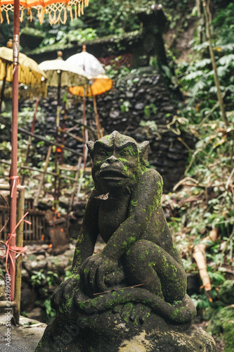 sculptures of monkey on the holy spring of Sebatг in Bali