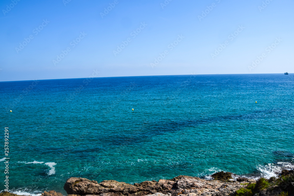 stone rocky coast view of the blue sea wave landscape  weather