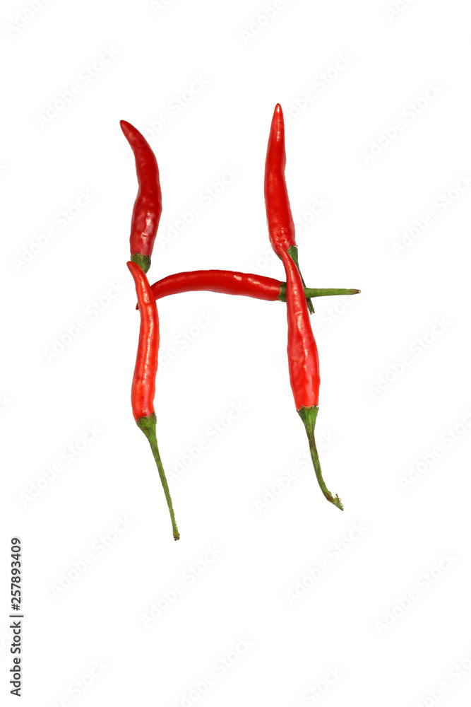 Alphabet of hot spice cayenne chili peppers isolated on white. Natural vegetarian diet organic vegetable chili peppers in shape of letter H, for making words and using as a logo Alphabet of hot spice cayenne chili peppers isolated on white. Natural vegetarian diet organic vegetable chili peppers in shape of letter H, for making words and using as a logo