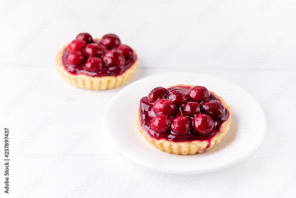 Fresh Homemade Tartlets Tart with Berries on White Background Tasty Tarts Decorated with Red Berries Horizontal Copy Space Beautiful Dessert Fresh Homemade Tartlets Tart with Berries on White Background Tasty Tarts Decorated with Red Berries Horizontal Copy Space Beautiful Dessert