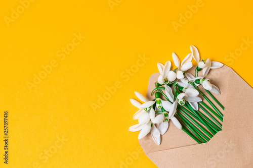 Craft envelope with a spring flower arrangement.