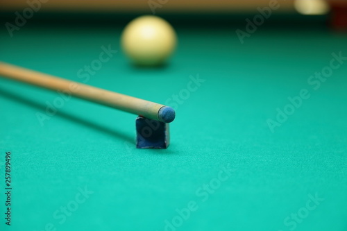 Billiards.Game of billiards.Gaming equipment for playing billiards. Lighting lamp.Cue.Billiard balls in the pocket. By the pocket . In the grid..Billiard balls in the triangle.