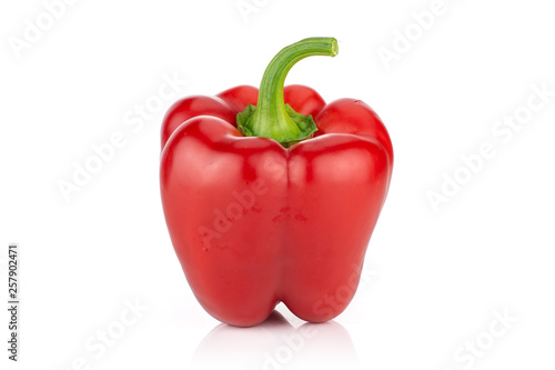 One whole bulgarian red bell pepper isolated on white background
