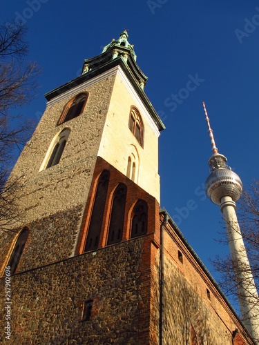 Berlin Germany St. Mary’s Church and TV Tower with blue sky