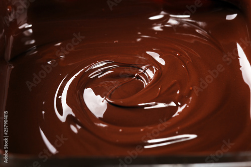 Melting chocolate, melted delicious chocolate for handmade praline icing confectionery