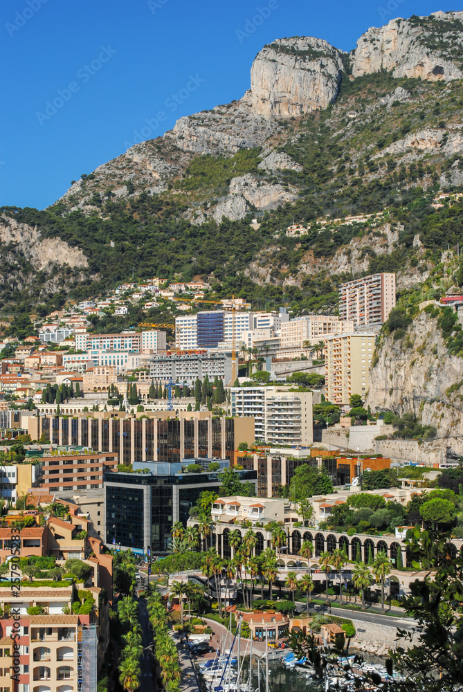 Cityscape of Monaco with mountains. Principality of Monaco, French Riviera